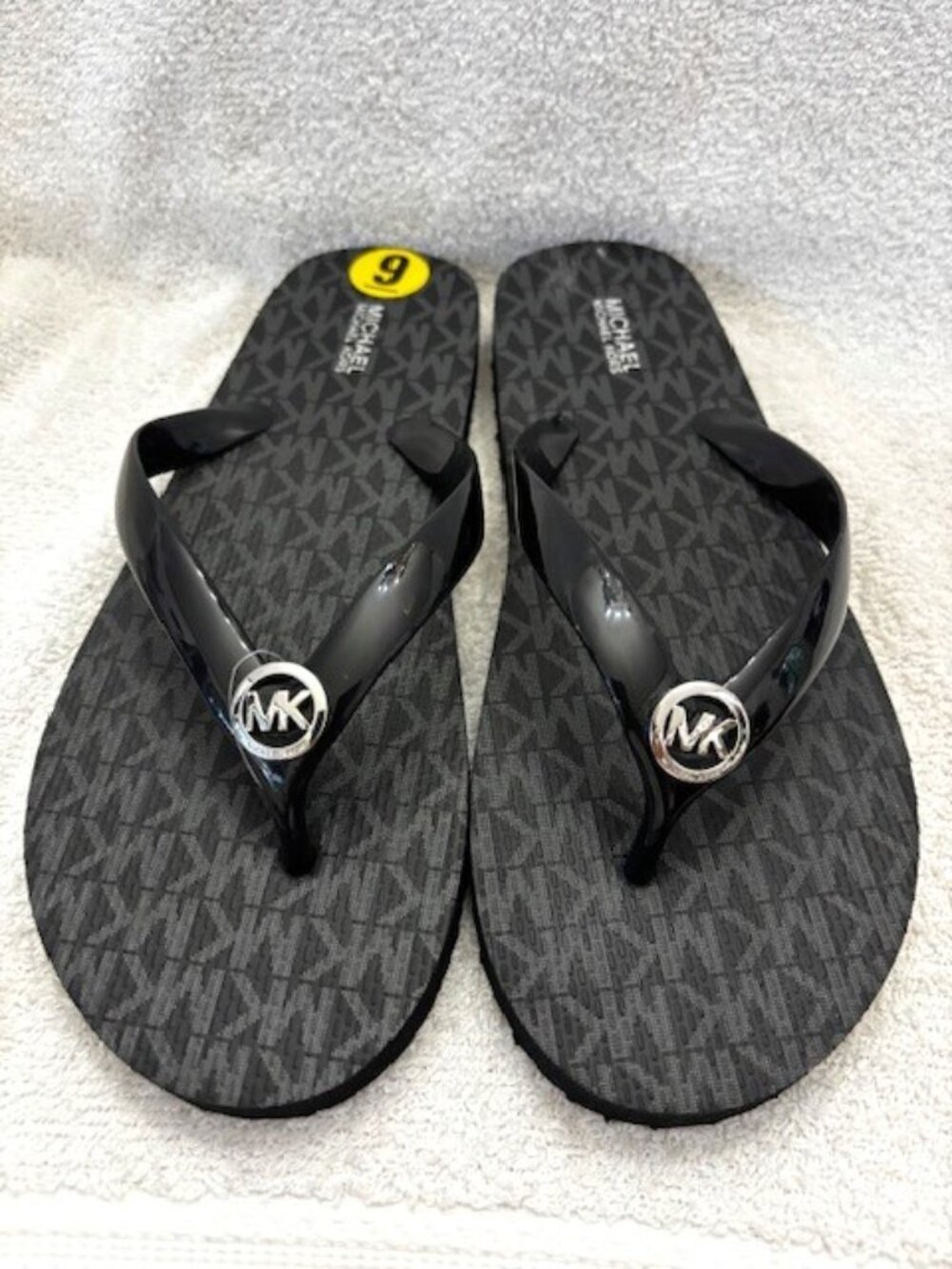 MICHAEL Michael Kors MK logo PVC Mini Jet Set flip flops NWOT Size 9